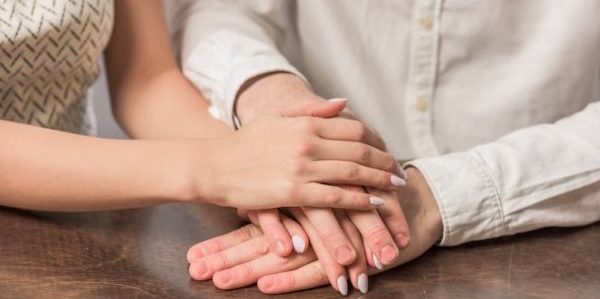 Spousal Support Basics in Ca divorce - Spouses holding hand for a Spousal Alimony.